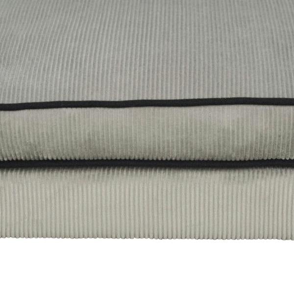 Grey corduroy-style pet sofa cushion with black piping seam, fabric close-up