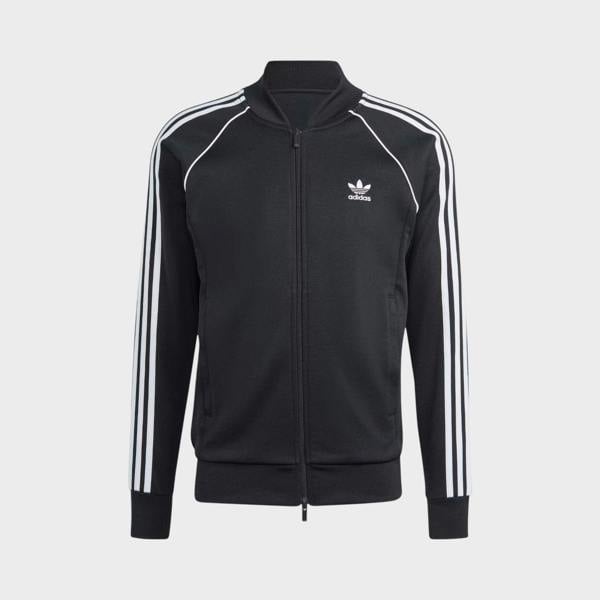 Supplied Fashion black adidas Adicolor Classics Superstar track top with white three-stripe sleeves and front zip.