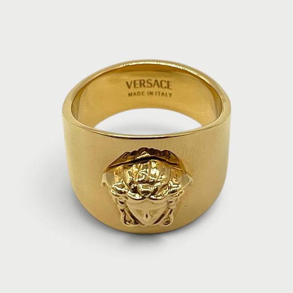 Supplied Fashion gold Medusa head statement ring with polished finish and engraved interior detail