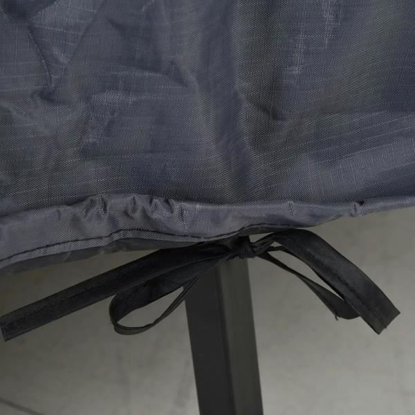 Close-up of grey cover underside with black drawstrings gathered at the hem