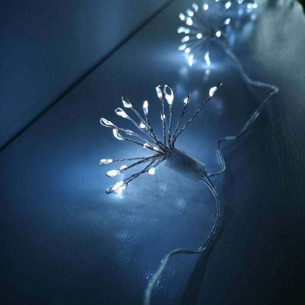 Samuel Alexander 200 LED 10 Starburst Premier Christmas Outdoor Battery Timer Lights in Cool White