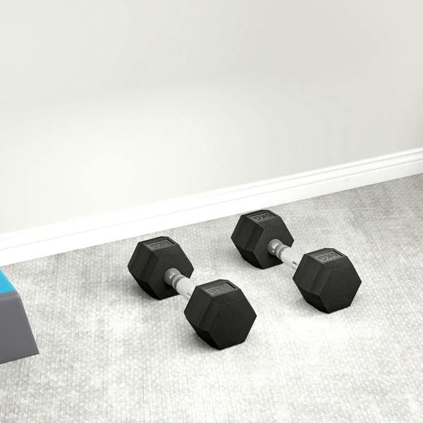 Black hex rubber dumbbells set, 6 kg each, with chrome handles on the floor