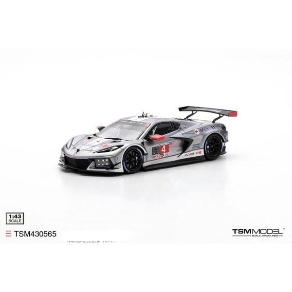 a silver race car with a white background