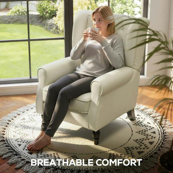 Cream wingback accent chair with button-tufted back and rolled arms