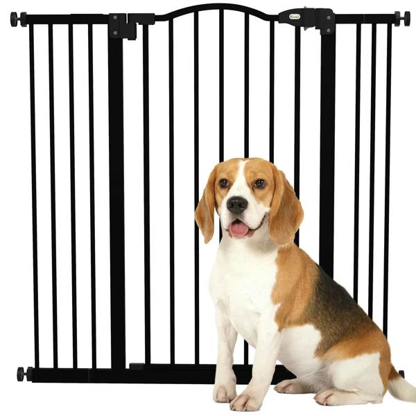 Black pressure-fit dog safety gate with vertical bars and arched top, open for pet