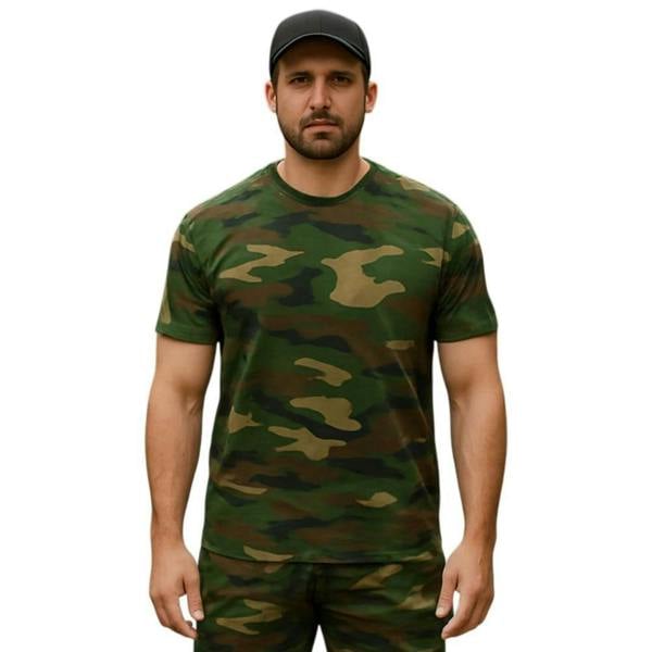 Model wearing the Game Camouflage Short Sleeve T-Shirt in woodland camo, a timeless addition to any camo clothing collection