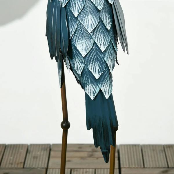 Blue steel crane ornament with scaled feather texture and gold leg pole