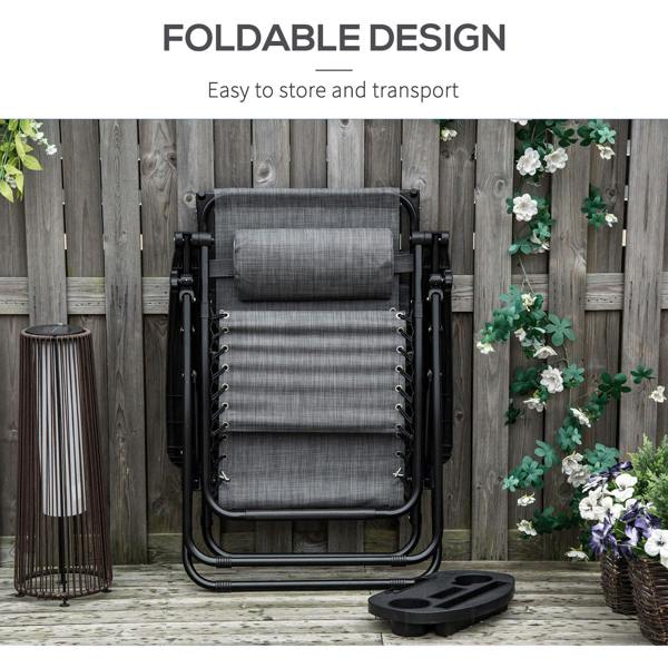 Light grey folding zero-gravity chair with footrest and mesh seat, reclined for use