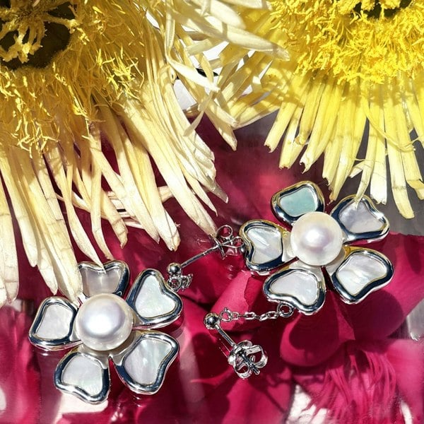 Silver floral earrings by LENAE London featuring freshwater pearls.