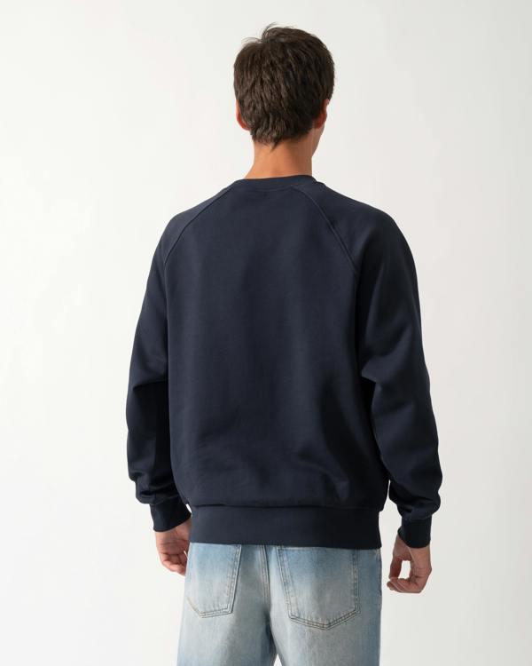 back of a model wearing a Moose Knuckles Mens Yul Crewneck Sweatshirt in Navy 833