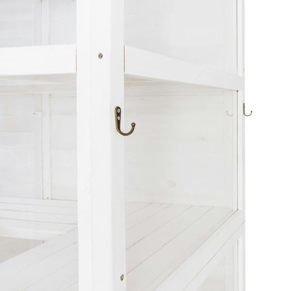 White Victorian greenhouse interior featuring wooden shelves, smooth surfaces, and decorative brass hooks for hanging plants