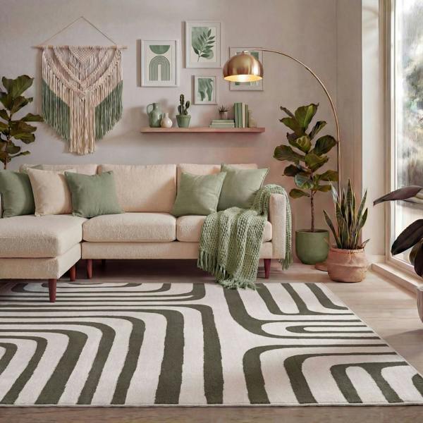 Living room with a beige sectional sofa, patterned rug, and decorative elements.