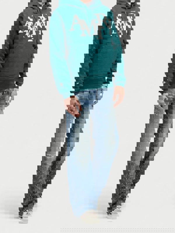 Amiri Staggered Logo Hoodie Rain Forest - Supplied FashionAmiri