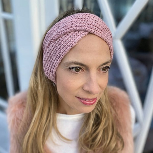 Pink winter headband, soft knitted fabric, wide crossover design, cosy ear warmer style
