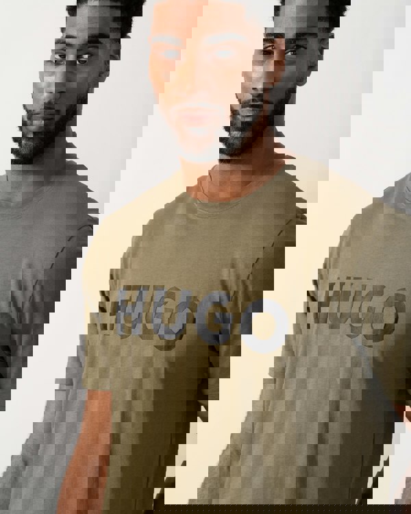 detail shot of a Model wearing a HUGO Dulivio Mens T-Shirt in Open Green