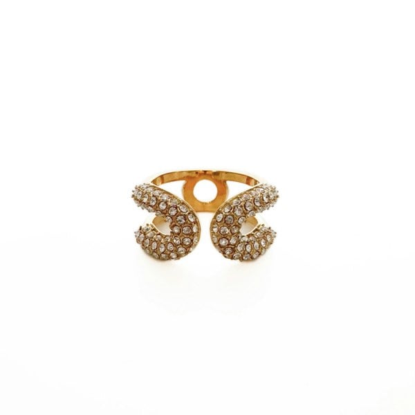 Gold ring with gemstones on a white background