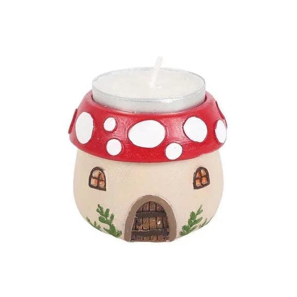 Mushroom house resin tealight holder with red polka-dot band, cream walls, arched doorway