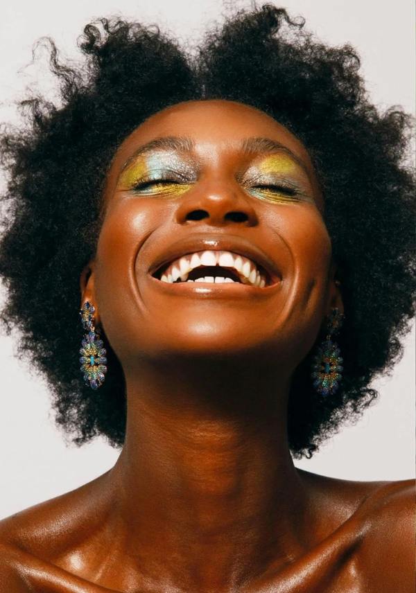 The earring worn by a model.