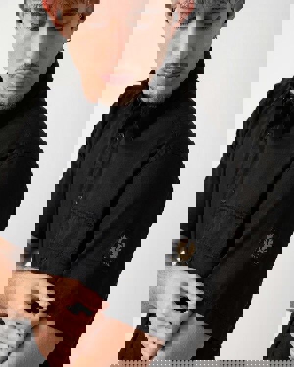 Close up shot of a Model wearing a Belstaff Scale Mens Short Sleeve Shirt in Black