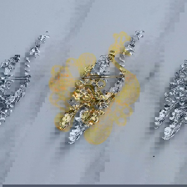 peacock brooch in gold back