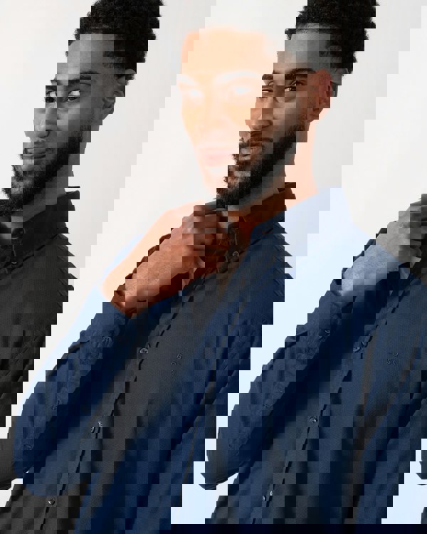 detail shot of a model wearing a BOSS Orange Rickert_M Mens Shirt in Open Blue