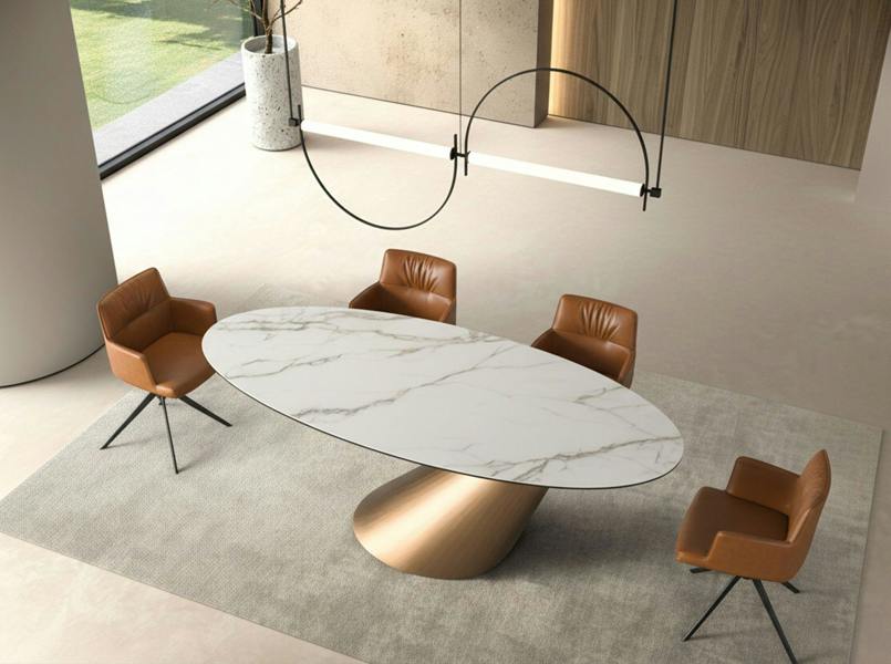 Angel Cerdá Oval dining table with porcelain marble and bronze-coloured steel barrel 1160