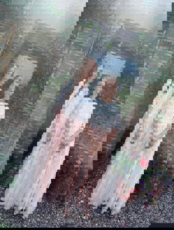 Two older children as flower girls 