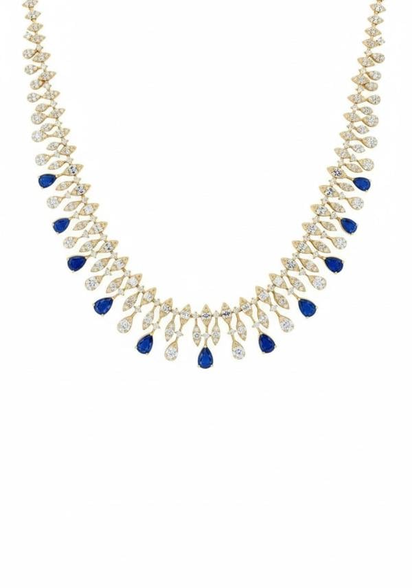Necklace with blue and clear gemstones on a white background