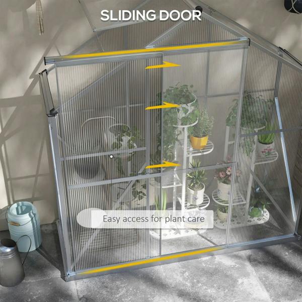 Walk-in greenhouse sliding door with clear panels and silver frame