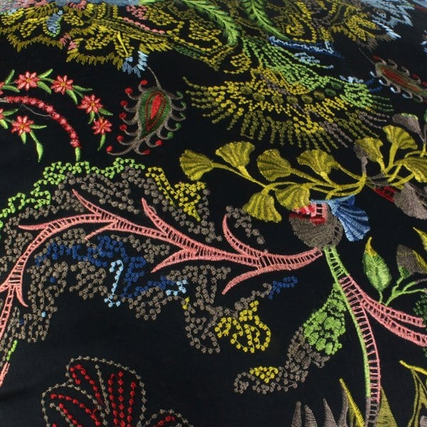 Luxurious cushion in Tumulte Arlequin fabric by Christian Lacroix Maison