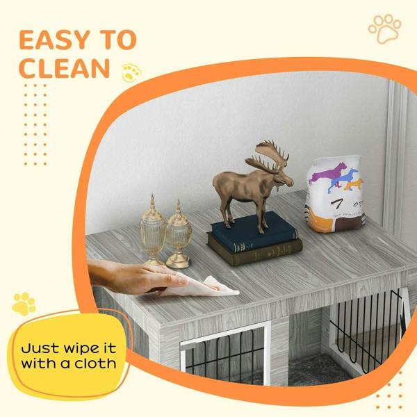 Grey indoor dog kennel interior with soft cushion and front wire gate; cleaning concept shown