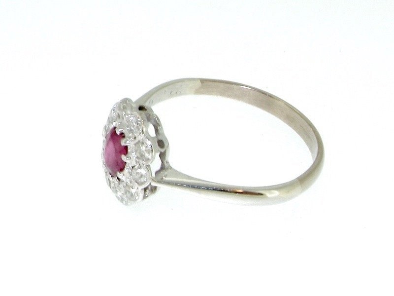 Vintage Tom A platinum ruby and diamond cluster ring