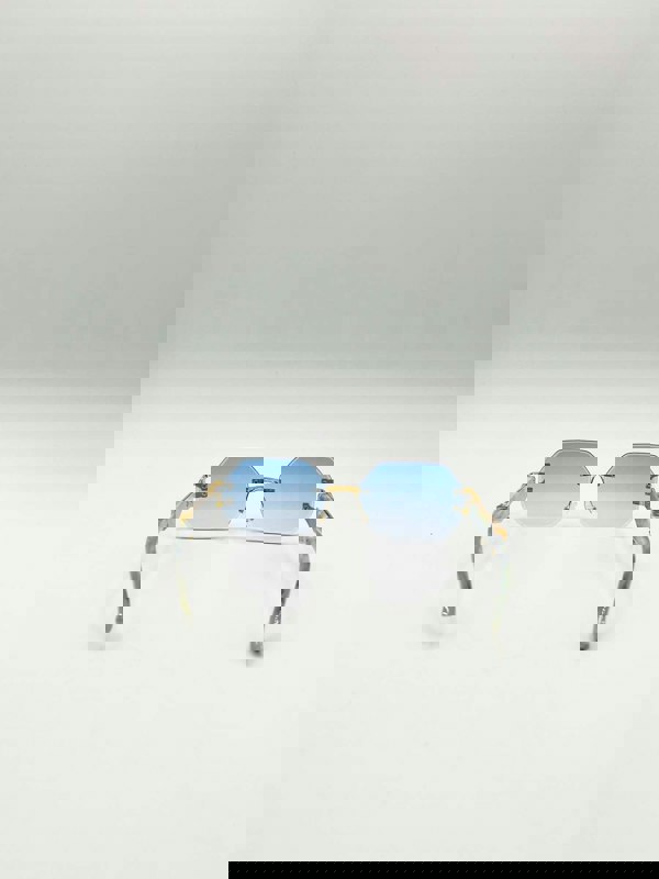 SVNX Rimless Oval Geometric Sunglasses in Gold Blue