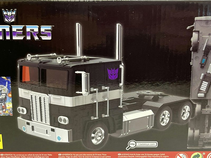 a toy truck in a box