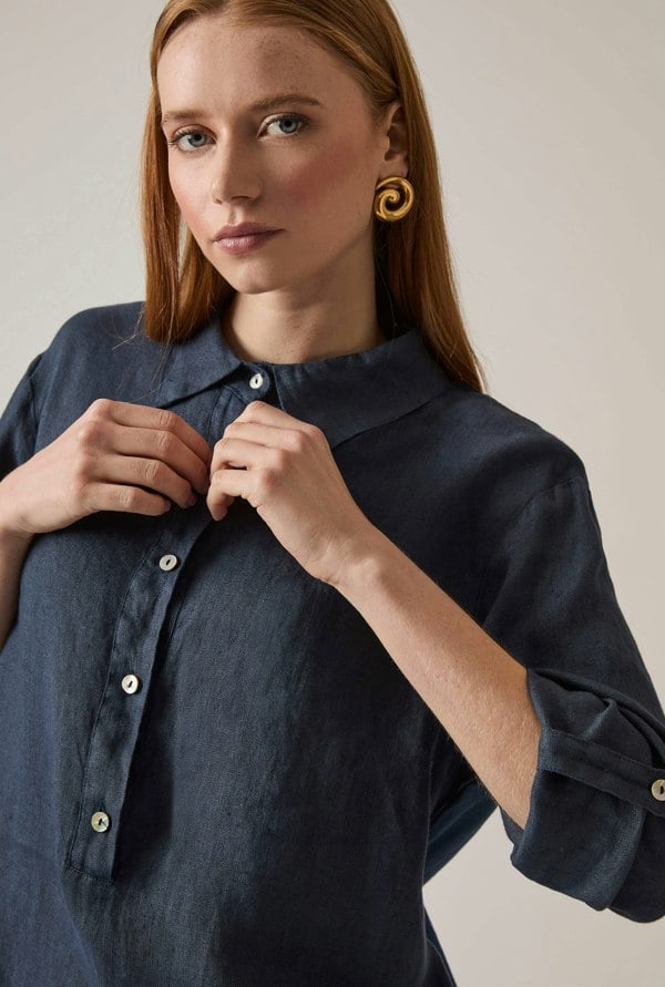 Navy linen blouse with button front and roll tabs