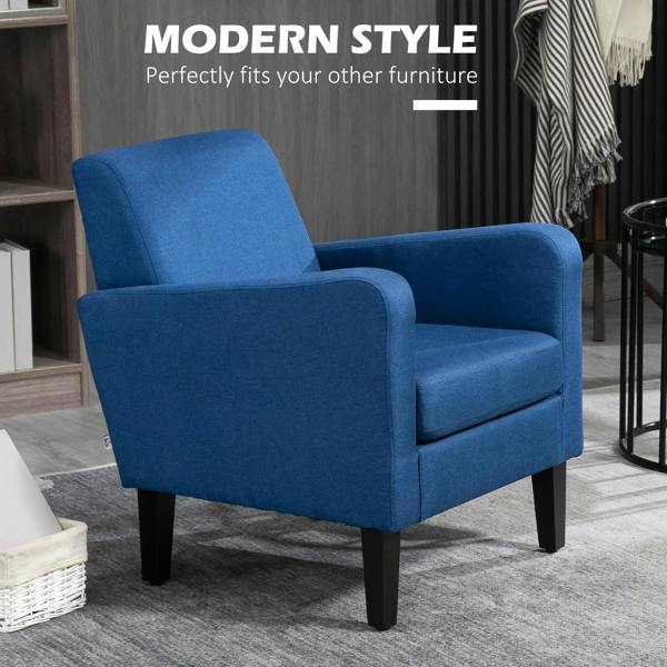 Blue boxy upholstered armchair with tall backrest, padded arms, and dark legs.