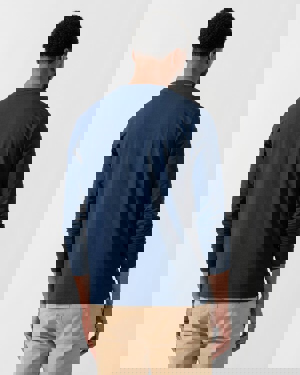 Model wearing BOSS Orange Tchark Long Sleeve Stretch Cotton T-Shirt in Open Blue 464 - back