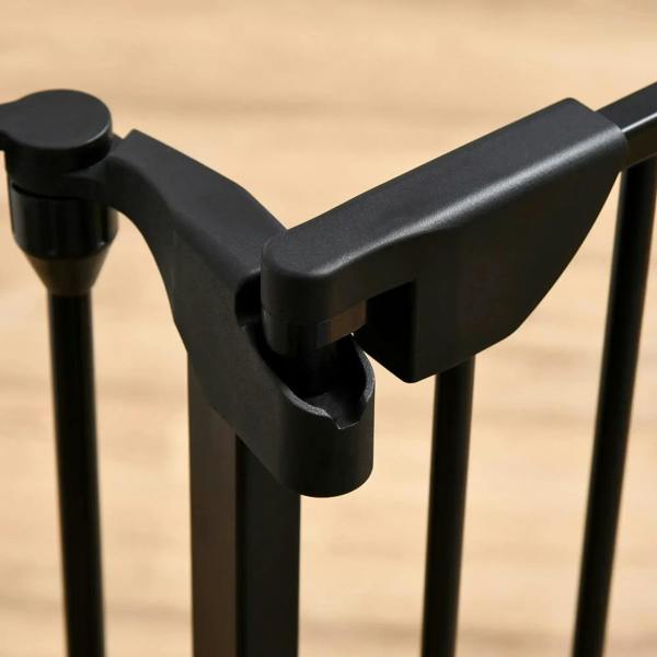 Black pet playpen fence door handle and latch assembly on metal bars