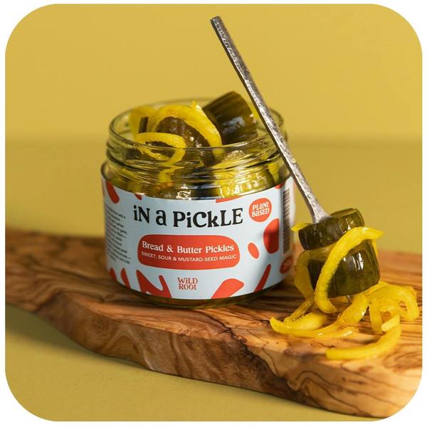 Bread & Butter Pickles in the opened jar with fork on the side 