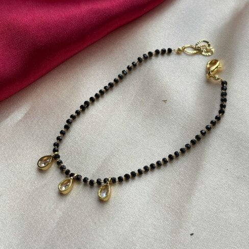 The Colourful Aura Elegant Black Beaded Nazar mangalsutra Dangle Zircon Bracelet