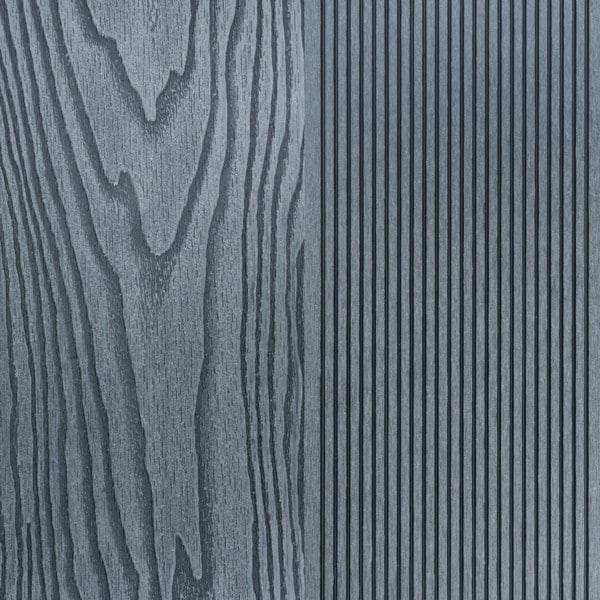 Grey composite decking boards showcasing a textured wood grain finish on one side and a ribbed pattern on the other side