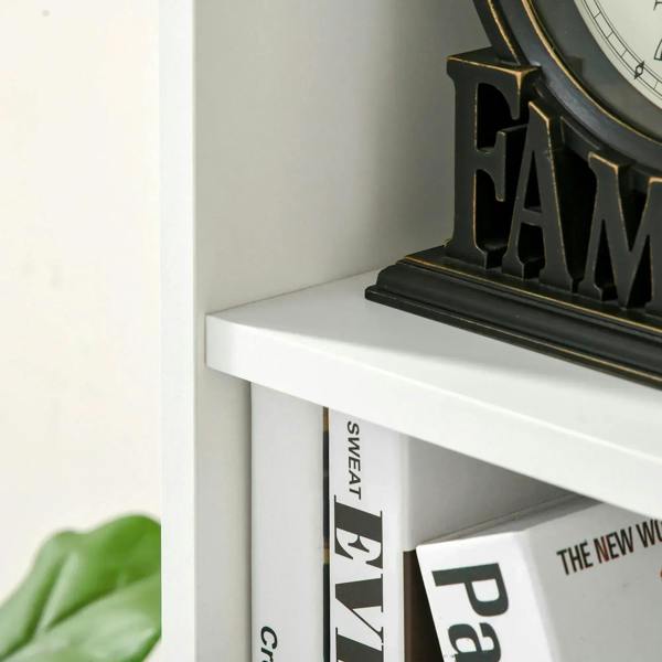 White bookcase cubby shelf with black lettered bookend and books.