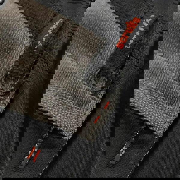 Scruffs Worker Plus Holster Mens Multi Pocket Cargo Shorts, close-up view of multiple pockets, durable fabric, and functional design with orange accents.