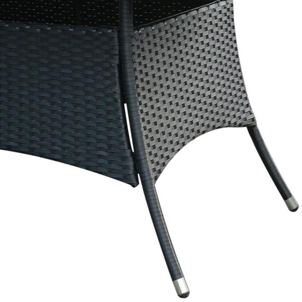 Black rattan armchair with woven texture and metal foot