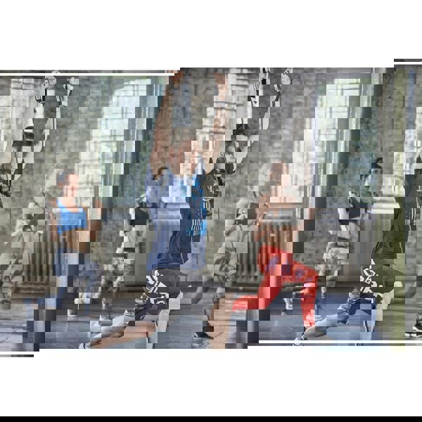 Gym class using Reebok Studio Adjustable Resistance Tube - Heavy