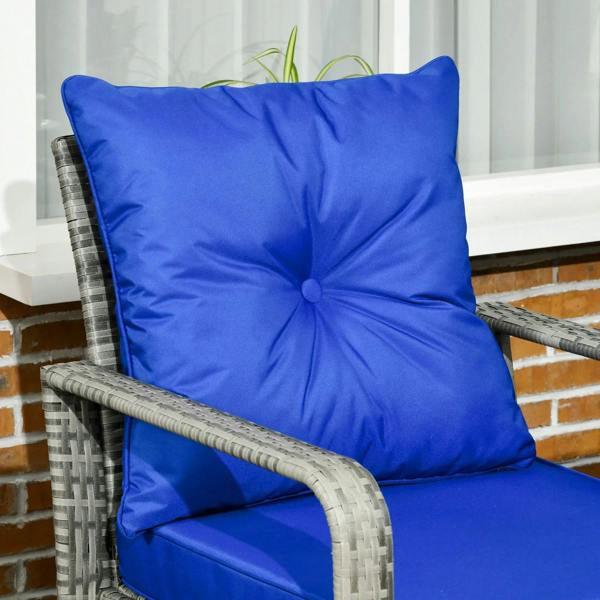 Single blue padded rattan armchair with tufted back cushion