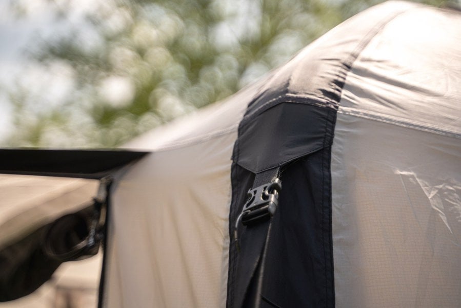The storm strap attachment point on a Snug Inflatable Tailgate Awning by OLPRO