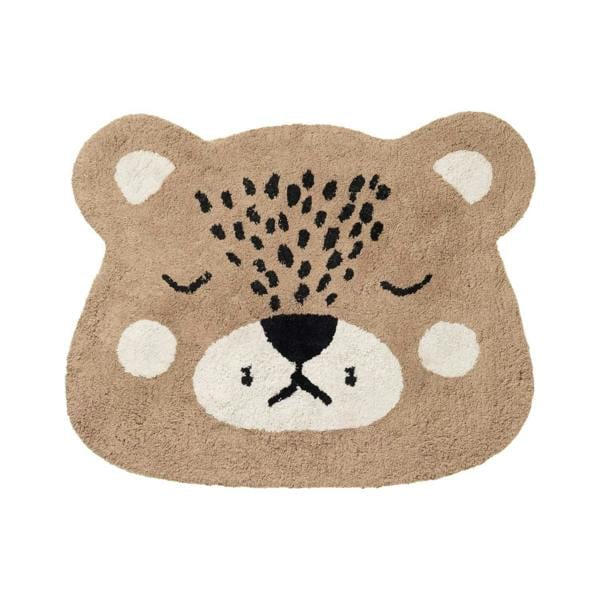 Bear-shaped doormat with a face design on a white background