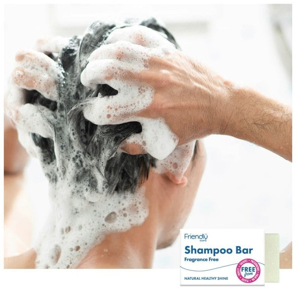 Woman washing her hair in the shower