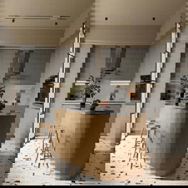 Modern kitchen with a wooden island and gray cabinets